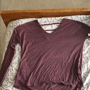 A long sleeve purple shirt